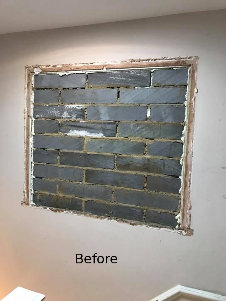 Blocked-up window opening on a staircase wall before plastering by our Maidstone plasterers