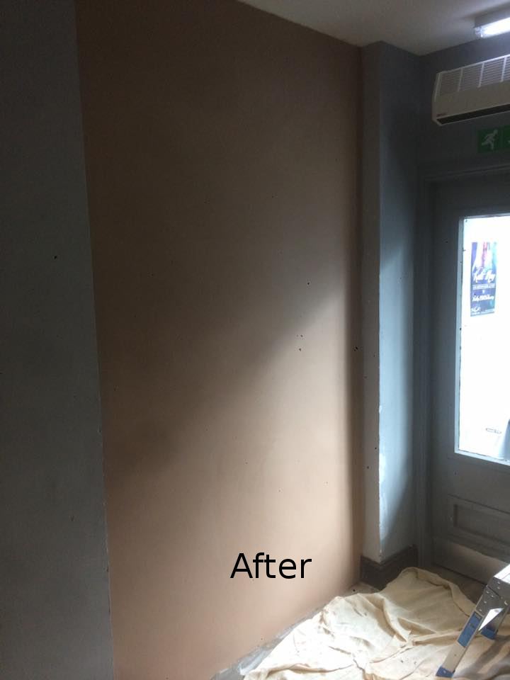 The same commercial wall after skimming by our Maidstone plasterers, ready for decorating